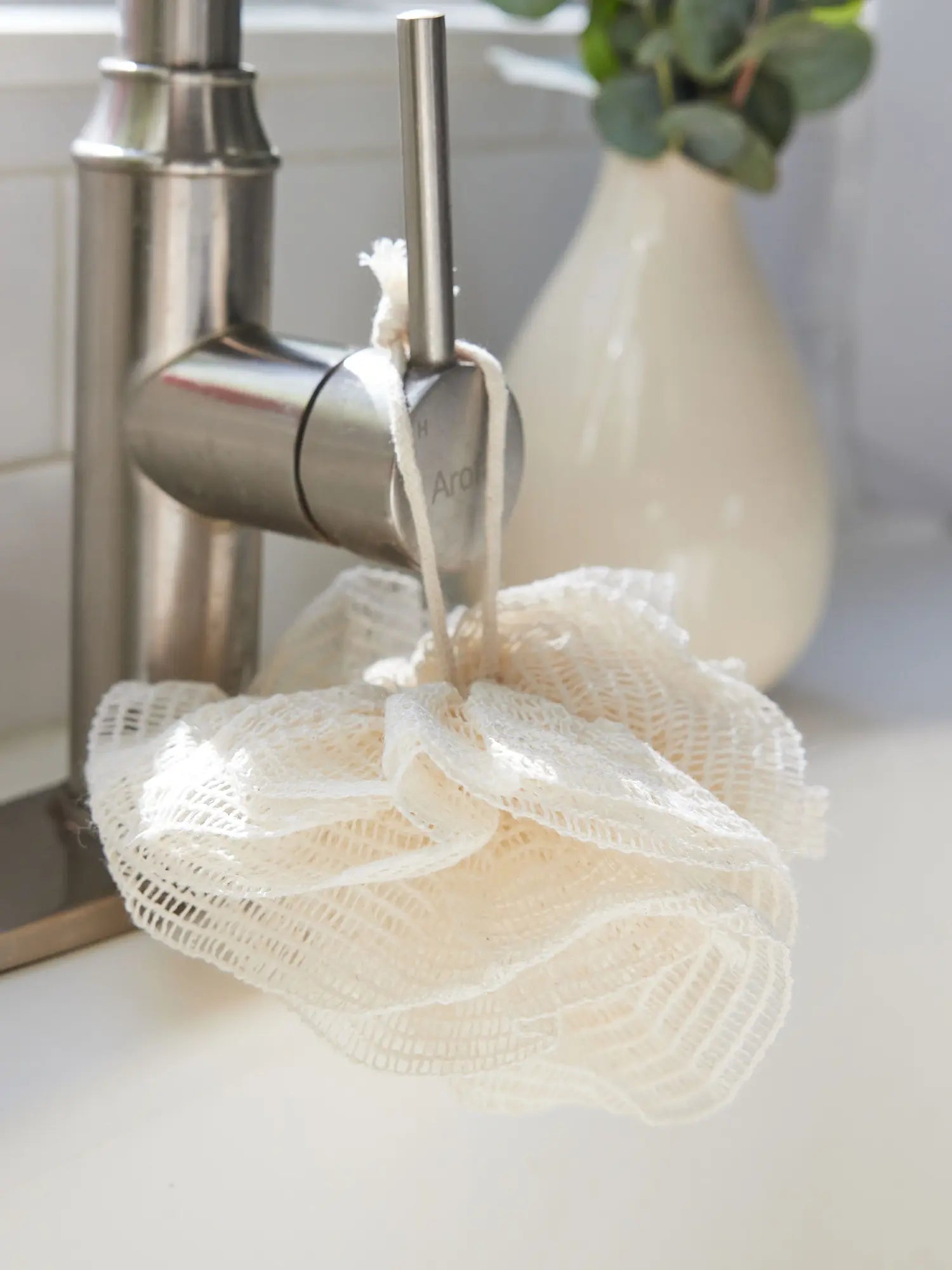 Closeup of a ramie mesh pouf from Juniper Loft Soap Company