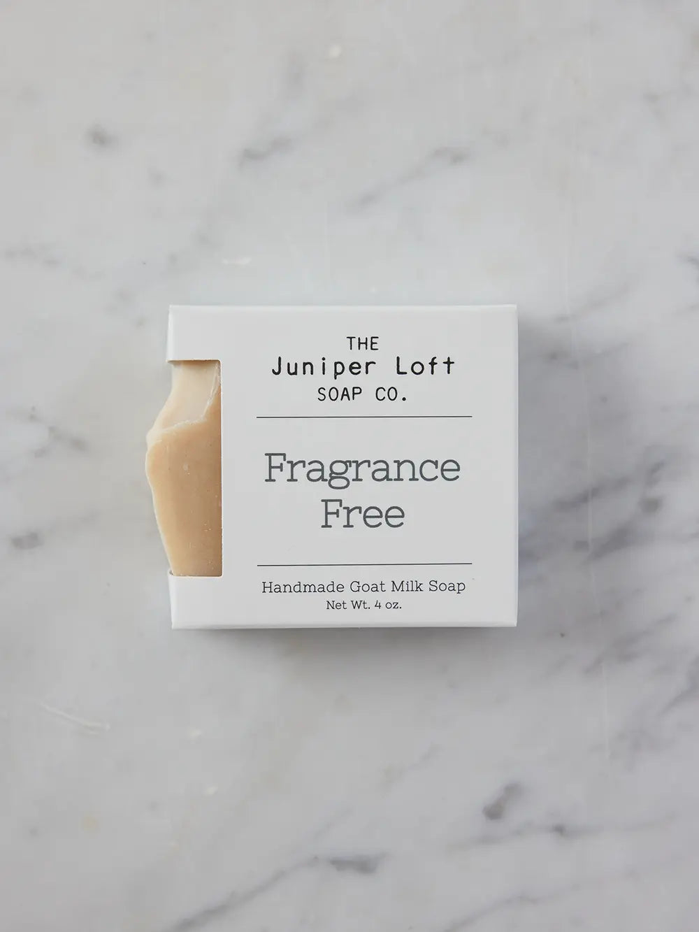 Bar of Fragrance Free soap from Juniper Loft Soap Company on gray marble