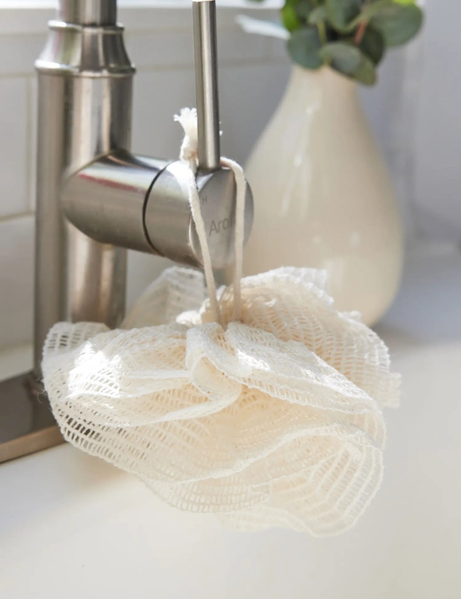 Closeup of a ramie mesh pouf from Juniper Loft Soap Company