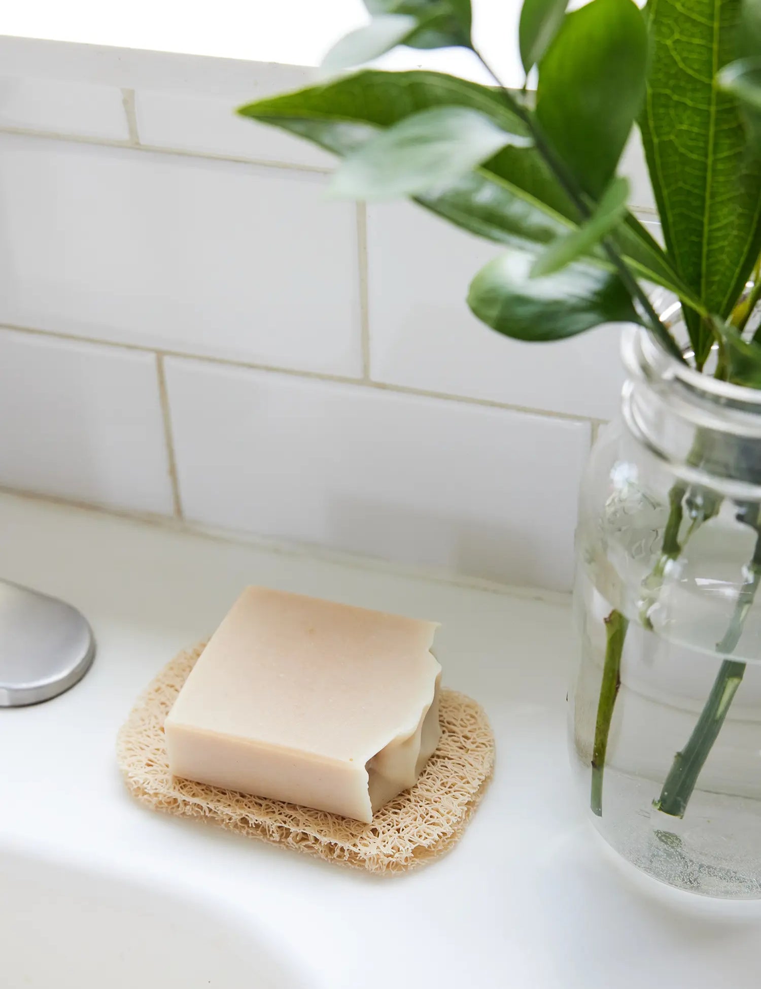 Juniper Loft Soap Company soap saver with a bar of soap on top on a bathroom sink
