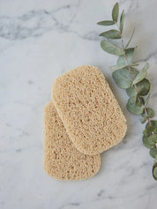 Pair of soap savers from Juniper Loft Soap Company on a gray marble countertop